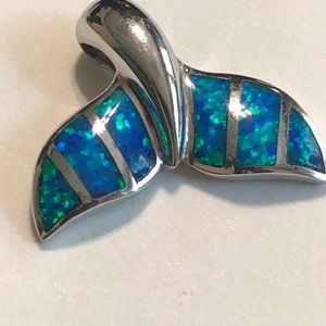 Women's sterling silver 'whale tail" pendant.
